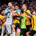 DOHA, QATAR - JUNE 13: Australia celebrate after defeating Peru in the 2022 FIFA World Cup Playoff match between Australia Socceroos and Peru at Ahmad Bin Ali Stadium on June 13, 2022 in Doha, Qatar. (Photo by Joe Allison/Getty Images) GETTY IMAGES