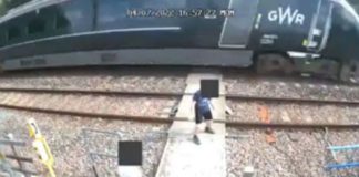 As the 125mph train approached, the two children were seen dancing and playing on the line source: mirroruk