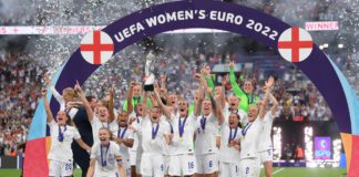 Leah Williamson of England lifts the UEFA Women's EURO 2022 Trophy after their sides victory during the UEFA Women's Euro 2022 final match between England and Germany at Wembley Stadium on July 31, 2022 in London, England. (Photo by Shaun Botterill/Getty) Image credit: Getty Images
