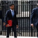 Huge blow for Boris Johnson as two senior UK government ministers resign Sajid Javid, Rishi Sunak and Boris Johnson (L-R) pictured outside Downing Street in London in September 2021.