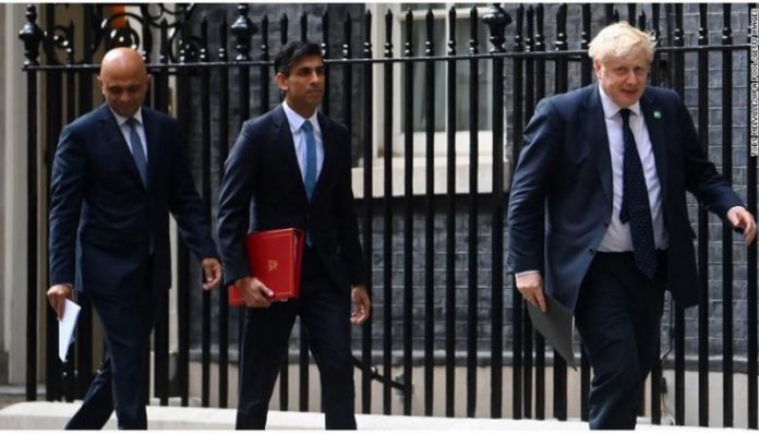 Sajid Javid, Rishi Sunak and Boris Johnson (L-R) pictured outside Downing Street in London in September 2021.