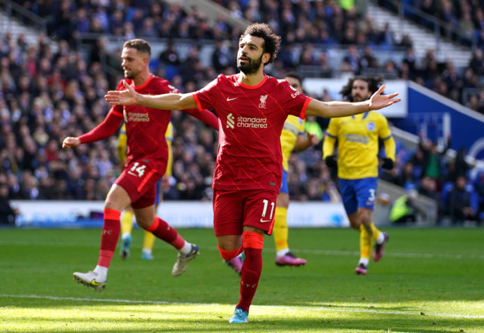 File photo dated 12-03-2022 of Liverpool's Mohamed Salah celebrating against Brighton in May 2022. Liverpool forward Mohamed Salah has signed a new long-term contract, the club have announced. Issue date: Friday July 1, 2022.