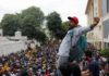Sri Lankan protesters inside the President's House in Colombo [Dinuka Liyanawatte/Reuters]