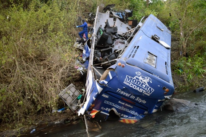 The bus veered off a bridge Credit: AP