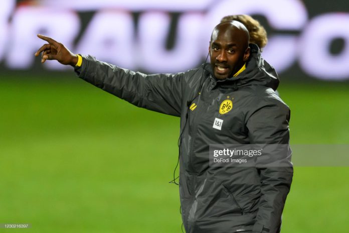 BERLIN, GERMANY - DECEMBER 18: (BILD ZEITUNG OUT) assistant coach Otto Addo of Borussia Dortmund gestures during the Bundesliga match between 1. FC Union Berlin and Borussia Dortmund at Stadion An der Alten Foersterei on December 18, 2020 in Berlin, Germany. (Photo by Mario Hommes/DeFodi Images via Getty Images)