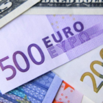 Euro falls below dollar for first time in 20 years