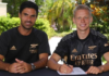 Oleksandr Zinchenko (right) has signed a 'long-term contract' with Mikel Arteta's side/ Photo credit: Getty Images