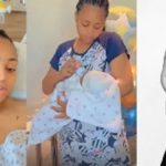 Regina Daniels with her newly born baby