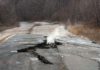 Smoke rises from a large crack in Route 61 caused by the ongoing underground fire in Centralia, Pennsylvania (Image: Don Emmert/AFP via Getty Images)