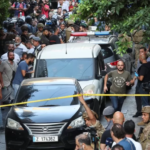 Gunman hailed hero for holding up bank over savings