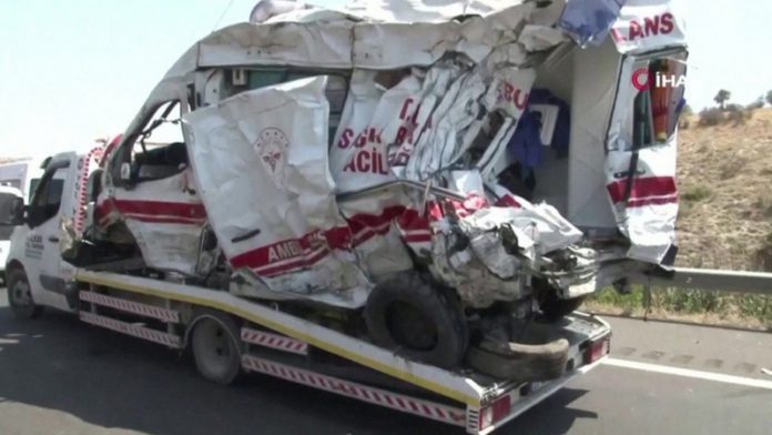 The wreck of the ambulance shows the force of the impact