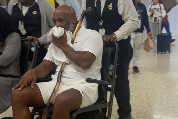 Mike Tyson was pictured in a wheelchair at Miami International Airport