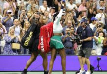 Serena and Venus Williams, pictured walking off Arthur Ashe Stadium after their defeat, have 14 Grand Slam doubles titles together