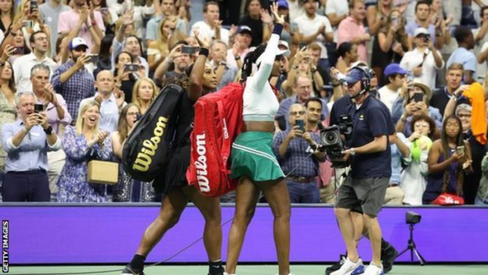 Serena and Venus Williams, pictured walking off Arthur Ashe Stadium after their defeat, have 14 Grand Slam doubles titles together