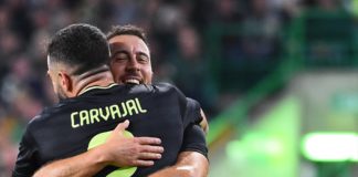 Real Madrid's Belgian forward Eden Hazard (rear R) celebrates with Real Madrid's Spanish defender Dani Carvajal after scoring his team third goal during the UEFA Champions League Group F football match between Celtic and Real Madrid, at the Celtic Park st Image credit: Getty Images