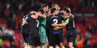 Real Sociedad players celebrate victory after the final whistle in the UEFA Europa League group E match between Manchester United and Real Sociedad at Old Trafford Image credit: Getty Images