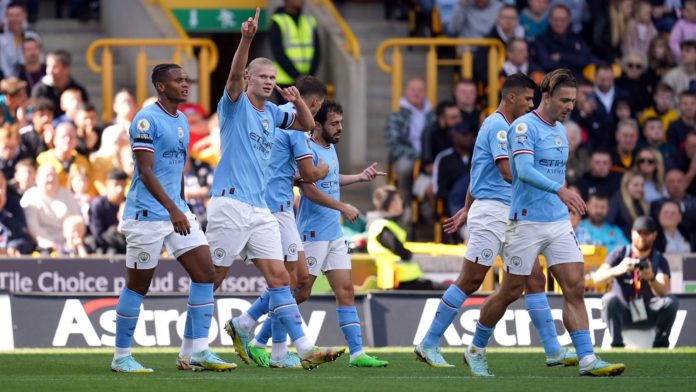 Erling-Haaland celebrates with Man City teammates