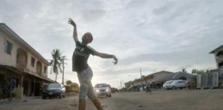 Anthony Madu dancing in the streets of Ajangbadi, Nigeria Disney/Motheo Moeng