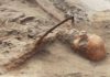 Female "vampire" with a sickle across her throat found in Pień, Poland