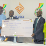 GFA boss Kurt Okraku [L] and Access Bank official [R]