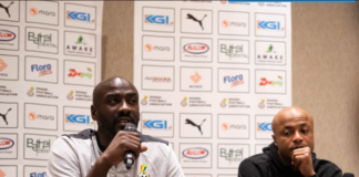 Otto Addo with Andre Ayew at a presser