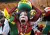 Supporters of Ghana's football squad cheer during the Group D, first round, 2010 World Cup football match Germany vs Ghana on June 23, 2010 at Soccer City stadium in Soweto, suburban Johannesburg. Germany won by 1-0. AFP PHOTO/Monirul Bhuiyan (Photo credit should read Monirul Bhuiyan/AFP via Getty Images)