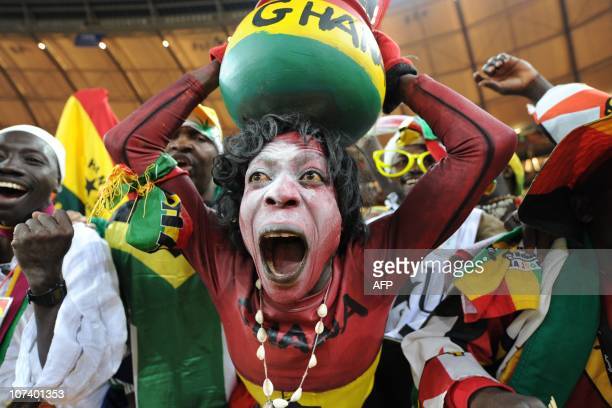 Supporters of Ghana's football squad cheer during the Group D, first round, 2010 World Cup football match Germany vs Ghana on June 23, 2010 at Soccer City stadium in Soweto, suburban Johannesburg. Germany won by 1-0. AFP PHOTO/Monirul Bhuiyan (Photo credit should read Monirul Bhuiyan/AFP via Getty Images)