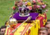 The coffin of Queen Elizabeth II being carried to St George's Chapel carrying the orb, sceptre and the crown all fixed in place (Image: Andy Commins / Daily Mirror)