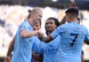 Erling Haaland celebrates with Joao Cancelo and Nathan Ake of Manchester City after scoring their team's fourth goal during the Premier League match between Manchester City and Southampton FC at Etihad Stadium on October 08, 2022 in Manchester, England. Image credit: Getty Images