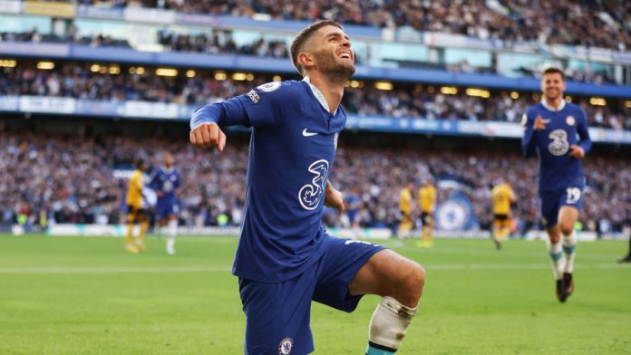 Christian Pulisic of Chelsea celebrates after scoring their team's second goal during the Premier League match between Chelsea FC and Wolverhampton Wanderers at Stamford Bridge on October 08, 2022 in London, England. Image credit: Getty Images