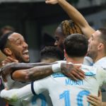 CL: Aubameyang seals Chelsea victory after Tomori red enrages Milan Chelsea's Gabonese striker Pierre-Emerick Aubameyang (L) celebrates with his teammates after scoring his team's second goal during the UEFA Champions League group E, football match between AC Milan and Chelsea, at the San Siro stadium, in Milan, on Octobe Image credit: Getty Images