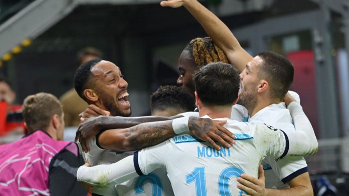 Chelsea's Gabonese striker Pierre-Emerick Aubameyang (L) celebrates with his teammates after scoring his team's second goal during the UEFA Champions League group E, football match between AC Milan and Chelsea, at the San Siro stadium, in Milan, on Octobe Image credit: Getty Images