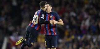 Barcelona's Polish forward Robert Lewandowski (R) celebrates scoring his team's second goal during the UEFA Champions League 1st round, group C, football match between FC Barcelona and Inter Milan at the Camp Nou stadium in Barcelona on October 12, 2022. Image credit: Getty Images