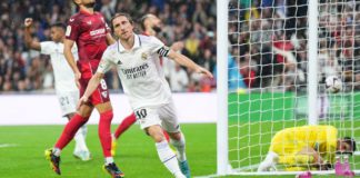 Luka Modric of Real Madrid celebrates after scoring their team's first goal during the LaLiga Santander match between Real Madrid CF and Sevilla FC at Estadio Santiago Bernabeu on October 22, 2022 in Madrid, Spain. (Photo by Angel Martinez/Getty Images) Image credit: Getty Images