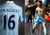 Aguero tore off the shirt, which is stained with both mud and champagne, in celebration