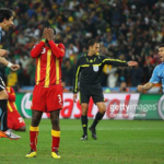 JOHANNESBURG, SOUTH AFRICA - JULY 02: Asamoah Gyan of Ghana reacts as he misses a late penalty kick in extra time to win the match during the 2010 FIFA World Cup South Africa Quarter Final match between Uruguay and Ghana at the Soccer City stadium on July 2, 2010 in Johannesburg, South Africa. (Photo by Cameron Spencer/Getty Images)