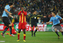 JOHANNESBURG, SOUTH AFRICA - JULY 02: Asamoah Gyan of Ghana reacts as he misses a late penalty kick in extra time to win the match during the 2010 FIFA World Cup South Africa Quarter Final match between Uruguay and Ghana at the Soccer City stadium on July 2, 2010 in Johannesburg, South Africa. (Photo by Cameron Spencer/Getty Images)