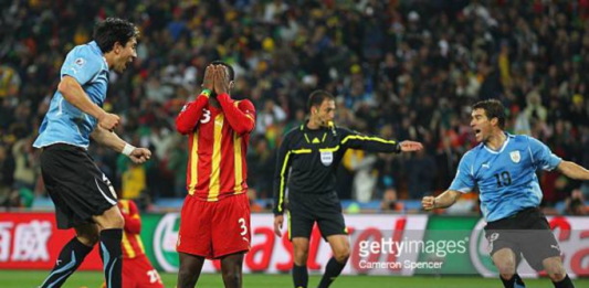 JOHANNESBURG, SOUTH AFRICA - JULY 02: Asamoah Gyan of Ghana reacts as he misses a late penalty kick in extra time to win the match during the 2010 FIFA World Cup South Africa Quarter Final match between Uruguay and Ghana at the Soccer City stadium on July 2, 2010 in Johannesburg, South Africa. (Photo by Cameron Spencer/Getty Images)