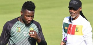 Andre Onana (left) and coach Rigobert Song, pictured during training on Sunday, have fallen out in an apparent row over tactics