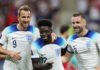 Bukayo Saka of England celebrates with teammates Harry Kane and Luke Shaw after scoring their team's fourth goal during the FIFA World Cup Qatar 2022 Group B match between England and IR Iran Image credit: Getty Images