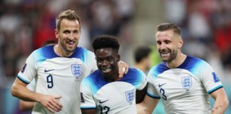 Bukayo Saka of England celebrates with teammates Harry Kane and Luke Shaw after scoring their team's fourth goal during the FIFA World Cup Qatar 2022 Group B match between England and IR Iran Image credit: Getty Images