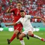 2022 World Cup: Denmark held by Tunisia after late penalty call denied Tunisia's forward Youssef Msekni (R) and Denmark's defender Joachim Andersen fight for the ball during the Qatar 2022 World Cup Group D football match between Denmark and Tunisia at the Education City Stadium in Al-Rayyan, west of Doha on November 22, 202 Image credit: Getty Images