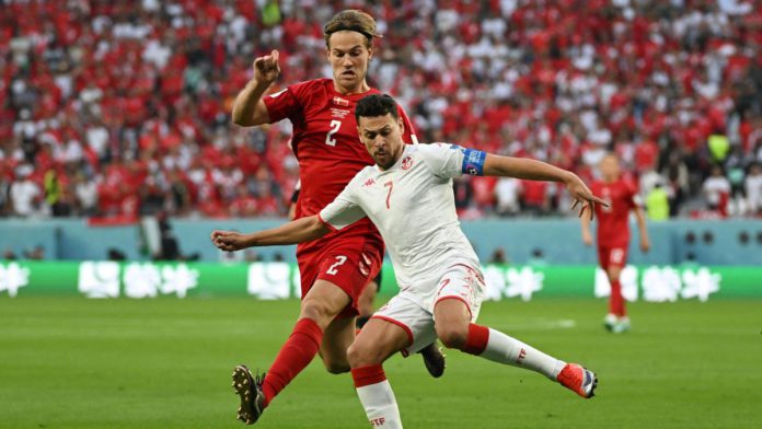 Tunisia's forward Youssef Msekni (R) and Denmark's defender Joachim Andersen fight for the ball during the Qatar 2022 World Cup Group D football match between Denmark and Tunisia at the Education City Stadium in Al-Rayyan, west of Doha on November 22, 202 Image credit: Getty Images