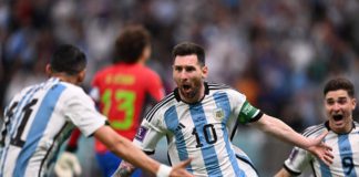 Argentina's forward #10 Lionel Messi celebrates scoring the opening goal with his teammate Argentina's midfielder #11 Angel Di Maria during the Qatar 2022 World Cup Group C football match between Argentina and Mexico at the Lusail Stadium in Lusail, north Image credit: Getty Images