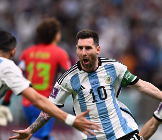 Argentina's forward #10 Lionel Messi celebrates scoring the opening goal with his teammate Argentina's midfielder #11 Angel Di Maria during the Qatar 2022 World Cup Group C football match between Argentina and Mexico at the Lusail Stadium in Lusail, north Image credit: Getty Images