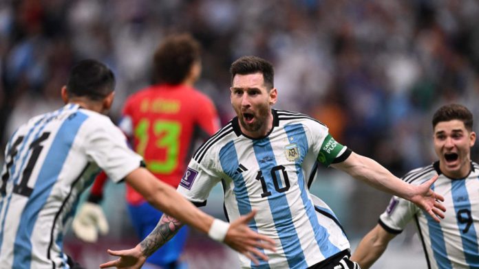 Argentina's forward #10 Lionel Messi celebrates scoring the opening goal with his teammate Argentina's midfielder #11 Angel Di Maria during the Qatar 2022 World Cup Group C football match between Argentina and Mexico at the Lusail Stadium in Lusail, north Image credit: Getty Images