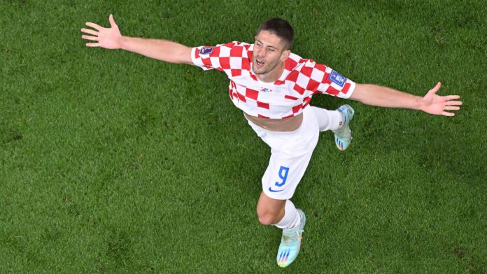 Andrej Kramaric celebrates scoring his team's third goal during the Qatar 2022 World Cup Group F football match between Croatia and Canada at the Khalifa International Stadium in Doha on November 27, 2022 Image credit: Getty Images