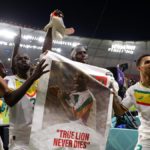 2022 World Cup: Senegal becomes first African country to secure last 16 berth Senegal players applaud fans with a banner of Papa Bouba Diop, on the 2nd anniversary of his death, after their 2-1 victory in the FIFA World Cup Qatar 2022 Group A match between Ecuador and Senegal at Khalifa International Stadium on November 29, 2022 Image credit: Getty Images
