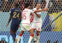 Wahbi Khazri of Tunisia celebrates after scoring their team's first goal during the FIFA World Cup Qatar 2022 Group D match between Tunisia and France at Education City Stadium on November 30, 2022 in Al Rayyan, Qatar. (Photo by Sarah Stier - FIFA/FIFA) Image credit: Getty Images