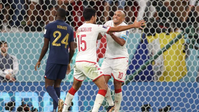 Wahbi Khazri of Tunisia celebrates after scoring their team's first goal during the FIFA World Cup Qatar 2022 Group D match between Tunisia and France at Education City Stadium on November 30, 2022 in Al Rayyan, Qatar. (Photo by Sarah Stier - FIFA/FIFA) Image credit: Getty Images